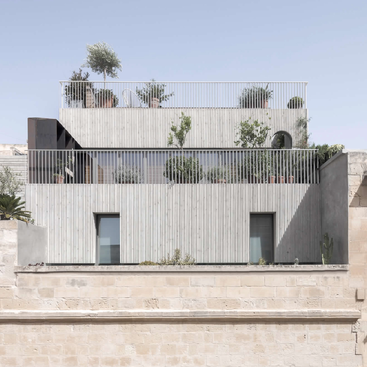 Progetto Casa Bottega di Briffa Architects con Fima rubinetterie